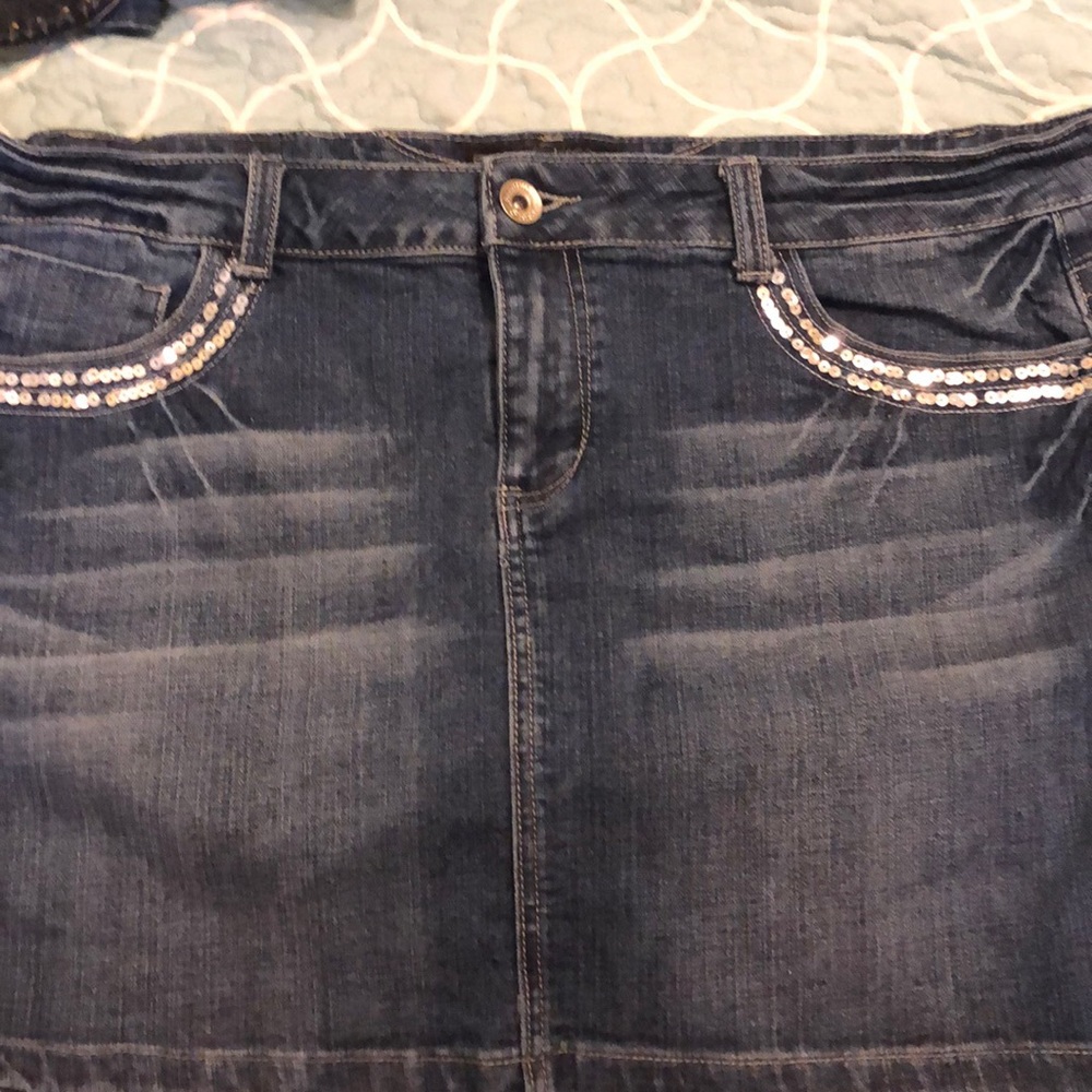 Jean skirt  stretchy.  With cute sequined pockets